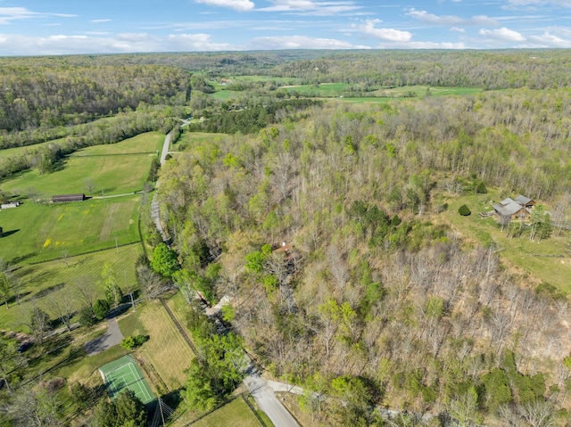 drone / aerial view with a rural view and a forest view