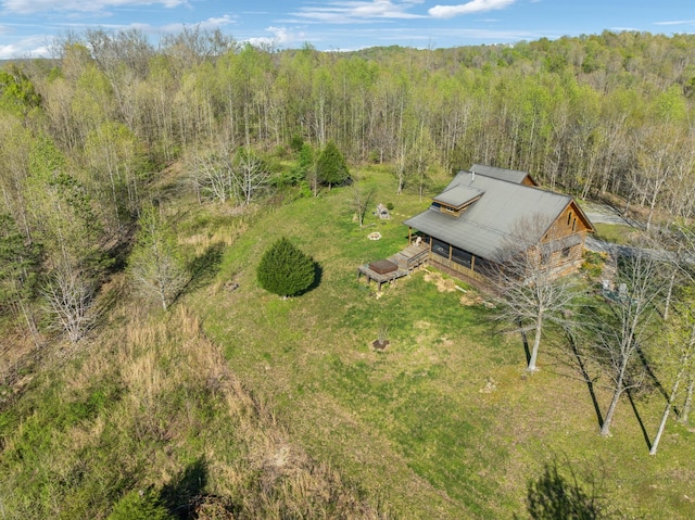 bird's eye view featuring a forest view