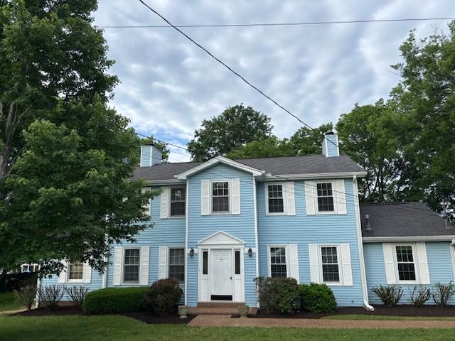 104B Twin Oaks Ct, Hendersonville, TN 37075 - colonial inspired home with a chimney and a front lawn