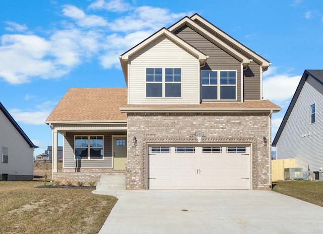 50 Gratton Ests, Clarksville, TN 37043 - view of front of house with brick siding, concrete driveway, a garage, and a porch