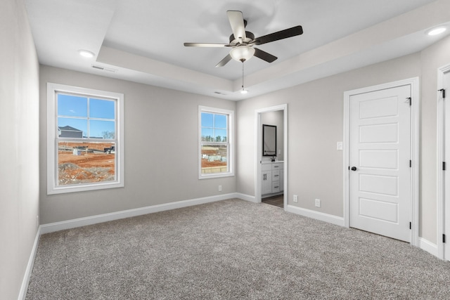 50 Gratton Ests, Clarksville, TN 37043 - unfurnished bedroom featuring carpet floors, baseboards, a raised ceiling, and recessed lighting