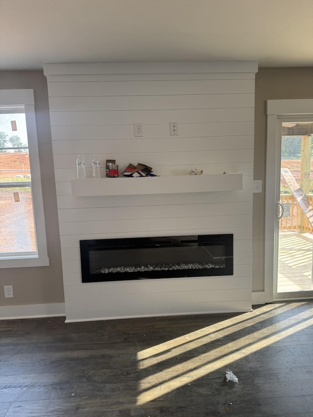 170 Cardinal Crk, Clarksville, TN 37040 - detailed view of a fireplace, wood finished floors, and baseboards