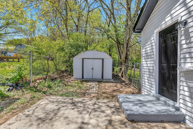 4817 Terragon Trl, Antioch, TN 37013 - view of patio / terrace with fence, an outbuilding, and a storage shed