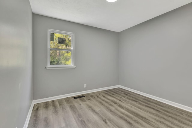 4817 Terragon Trl, Antioch, TN 37013 - empty room featuring wood finished floors, visible vents, and baseboards