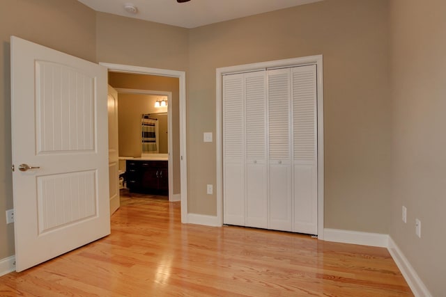 2256 Ellington Gait Dr, Clarksville, TN 37043 - unfurnished bedroom with light wood finished floors and a closet