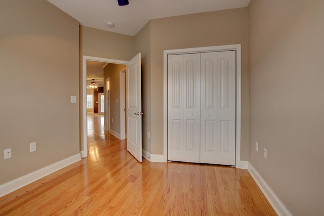 2256 Ellington Gait Dr, Clarksville, TN 37043 - unfurnished bedroom featuring light wood-type flooring, a closet, and ceiling fan