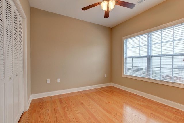 2256 Ellington Gait Dr, Clarksville, TN 37043 - unfurnished bedroom with light wood-type flooring, a closet, and a ceiling fan