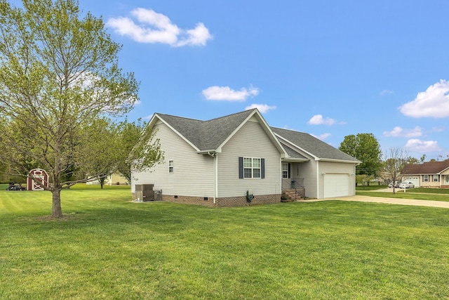 view of front of property with central AC unit, a front yard, a shingled roof, a garage, and concrete driveway