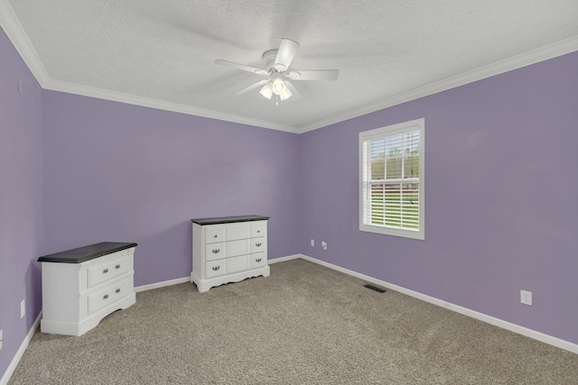 unfurnished bedroom featuring crown molding, visible vents, light carpet, and a textured ceiling