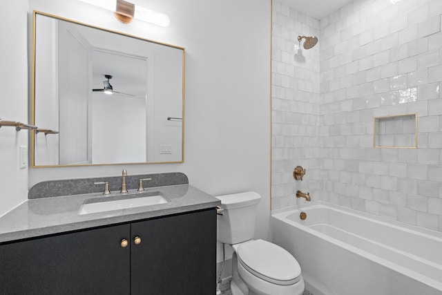 full bath with shower / bathing tub combination, toilet, vanity, and ceiling fan