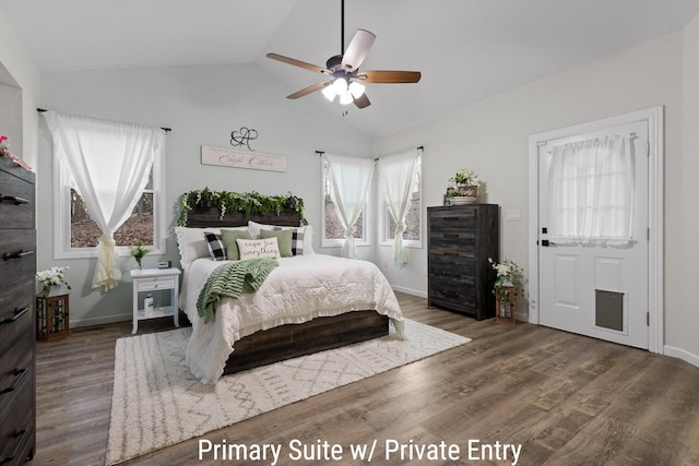 bedroom with wood finished floors, baseboards, a ceiling fan, and vaulted ceiling