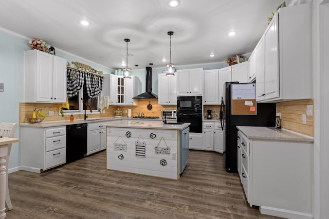 kitchen with white cabinets, a sink, wall chimney range hood, black appliances, and decorative backsplash