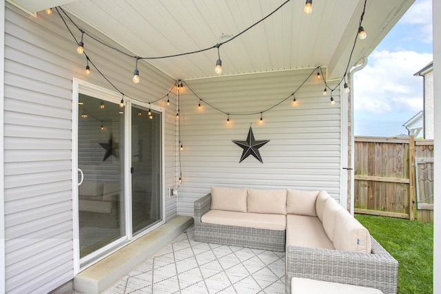 view of patio / terrace featuring fence and an outdoor living space