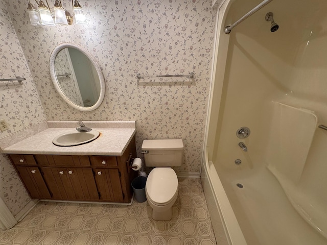 bathroom with vanity, baseboards, wallpapered walls, shower / bath combination, and toilet