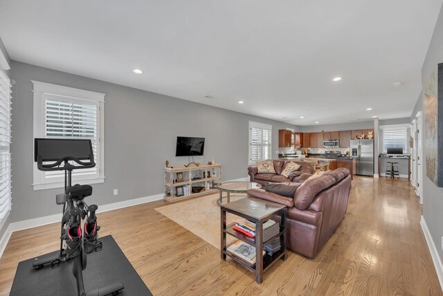 613 Chesterfield Way, Nashville, TN 37212 - living area with baseboards, light wood finished floors, and recessed lighting