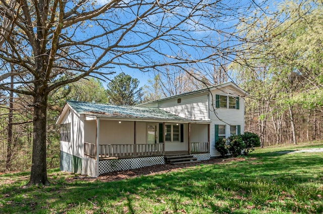 1425 Wesley Rd, Bon Aqua, TN 37025 - view of front of property with a front lawn and a porch