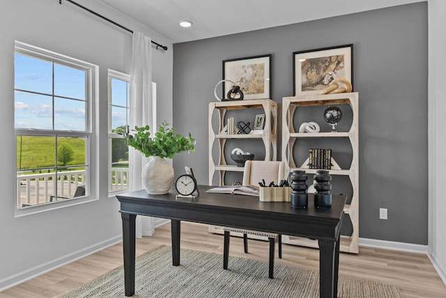 office space with baseboards, recessed lighting, and wood finished floors