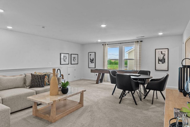 interior space with baseboards and recessed lighting