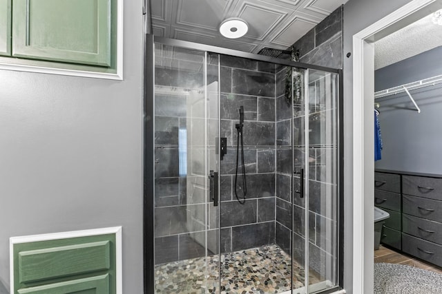 full bath featuring toilet and a stall shower