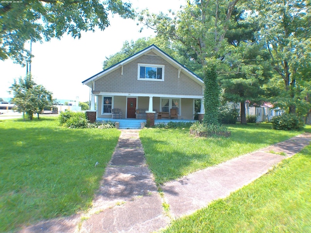 201 Hodges St N, Cowan, TN 37318 - craftsman-style house with a porch and a front yard