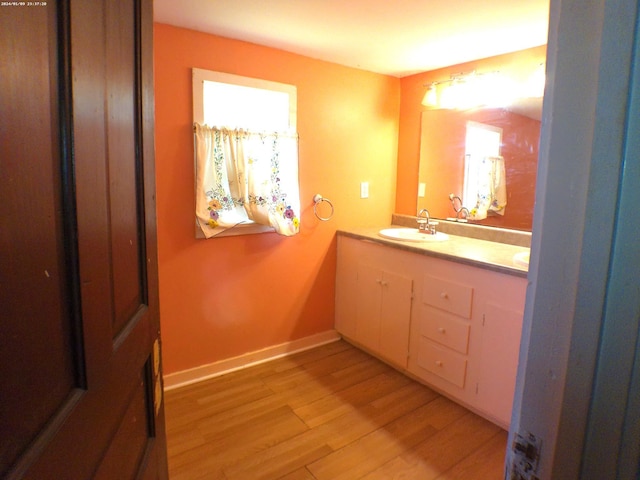 201 Hodges St N, Cowan, TN 37318 - bathroom with double vanity and wood finished floors