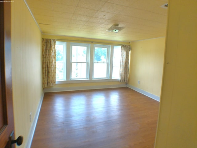 201 Hodges St N, Cowan, TN 37318 - unfurnished room with wood finished floors and baseboards