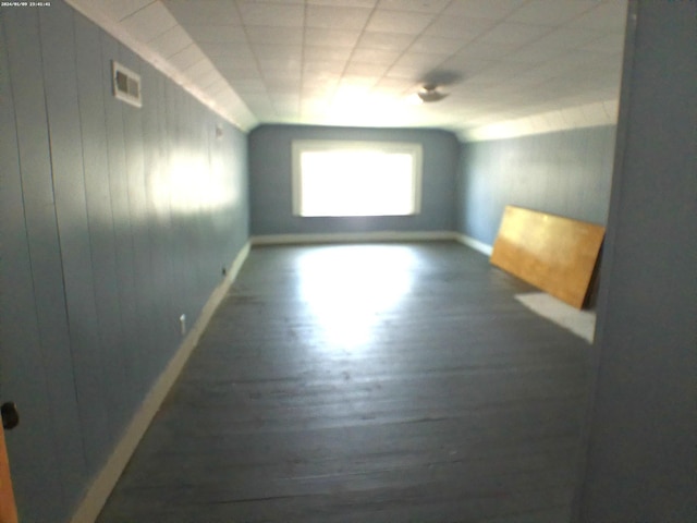 201 Hodges St N, Cowan, TN 37318 - empty room with wood finished floors and wood walls