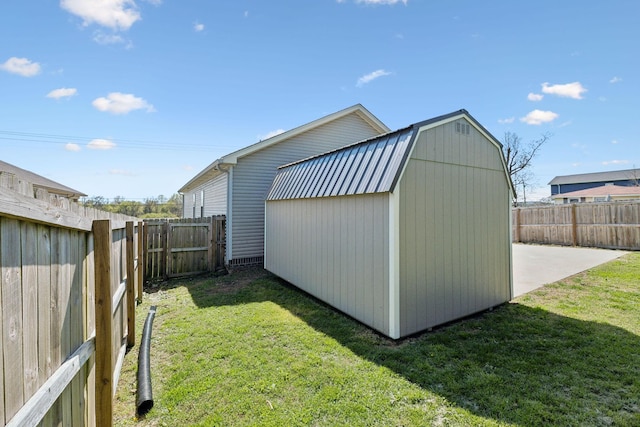 view of shed featuring a fenced backyard