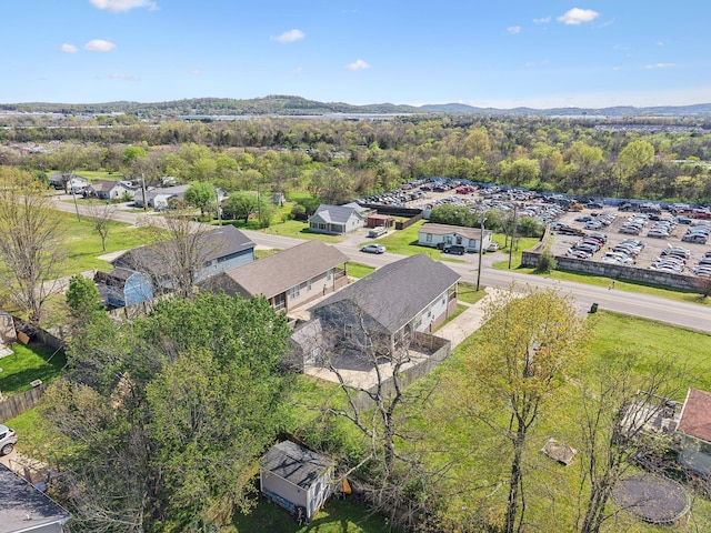 drone / aerial view with a mountain view and a residential view