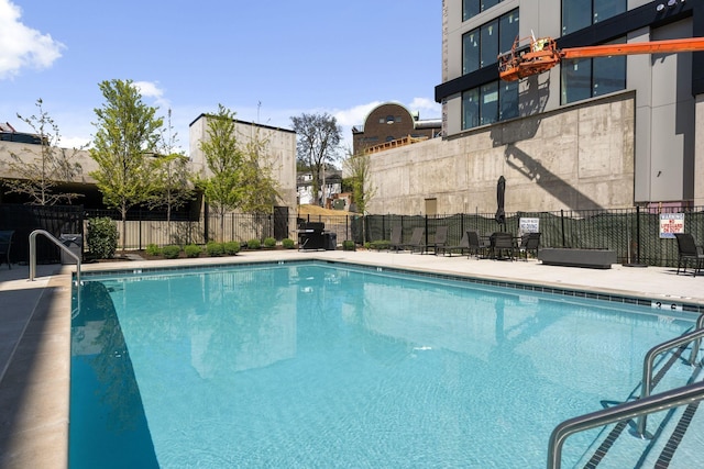 303 31st Ave N Unit 518, Nashville, TN 37203 - view of swimming pool featuring fence