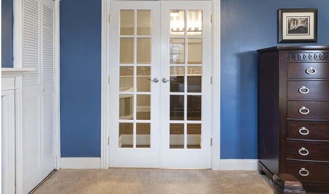 4712 Miners Cv, Antioch, TN 37013 - doorway to outside featuring french doors, baseboards, and carpet