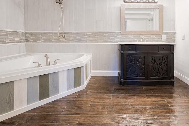 4712 Miners Cv, Antioch, TN 37013 - full bath featuring wood finished floors, vanity, and a washtub