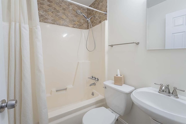 4712 Miners Cv, Antioch, TN 37013 - bathroom featuring shower / bath combo with shower curtain, a sink, and toilet