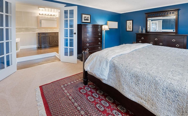 4712 Miners Cv, Antioch, TN 37013 - bedroom with crown molding, french doors, and carpet flooring