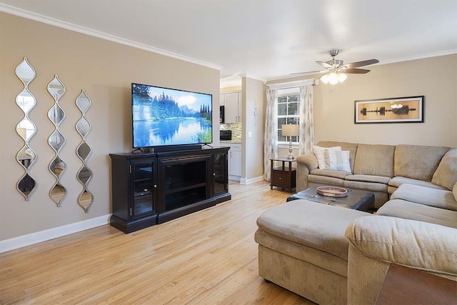 4712 Miners Cv, Antioch, TN 37013 - living area with baseboards, light wood-type flooring, crown molding, and ceiling fan