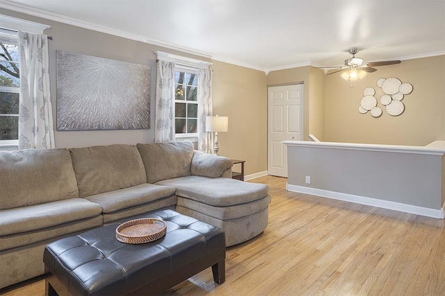 4712 Miners Cv, Antioch, TN 37013 - living area featuring light wood-type flooring, crown molding, and plenty of natural light