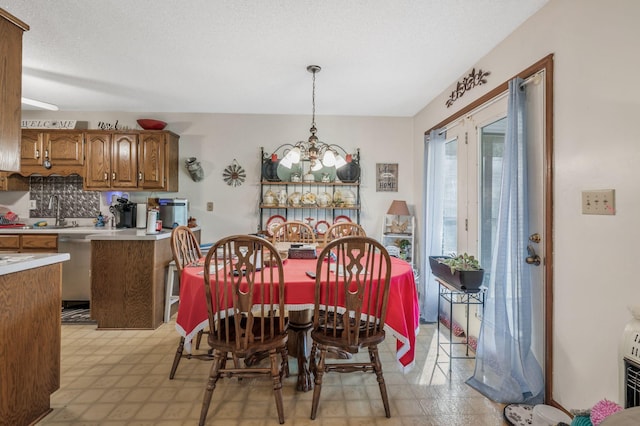 4801 Old Shelbyville Rd, Tullahoma, TN 37388 - dining room featuring light floors and a notable chandelier