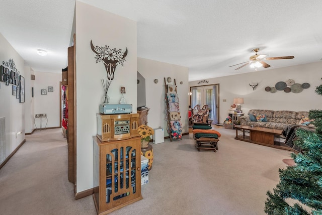 4801 Old Shelbyville Rd, Tullahoma, TN 37388 - living room featuring carpet floors, a ceiling fan, a textured ceiling, and visible vents