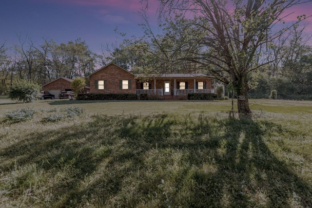 4801 Old Shelbyville Rd, Tullahoma, TN 37388 - exterior space featuring a yard and covered porch