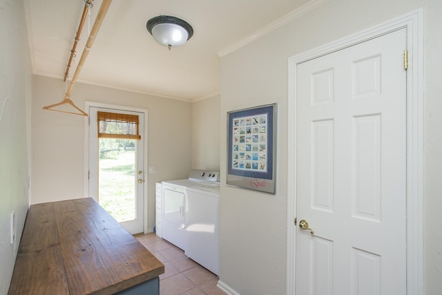 1035 Forest Harbor Dr, Hendersonville, TN 37075 - laundry room featuring ornamental molding, washing machine and dryer, laundry area, and light tile patterned floors