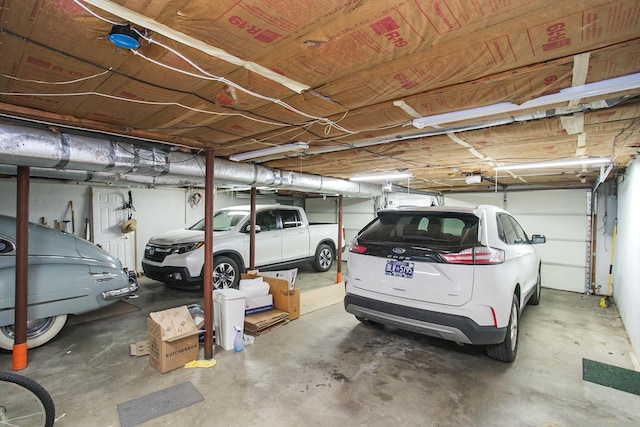 1035 Forest Harbor Dr, Hendersonville, TN 37075 - parking deck featuring a garage door opener