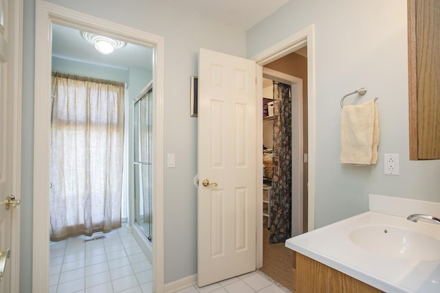1035 Forest Harbor Dr, Hendersonville, TN 37075 - bathroom with tile patterned floors, a sink, and a stall shower