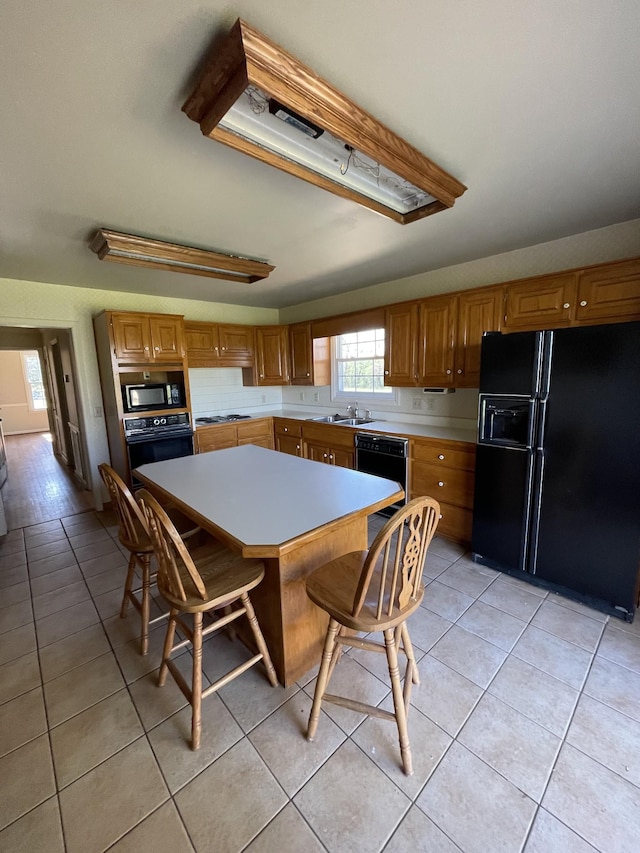 dining space featuring light tile patterned floors