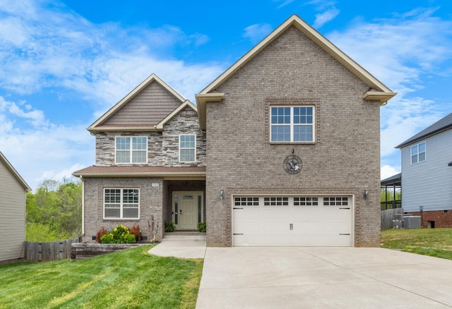 view of front of home with central air condition unit, concrete driveway, a garage, brick siding, and a front yard