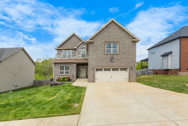view of front facade featuring driveway, a front lawn, cooling unit, and a garage