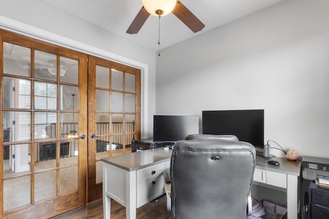 home office featuring a ceiling fan, french doors, and wood finished floors