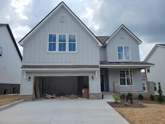 4811 Kintore, Nolensville, TN 37135 - view of front of home featuring board and batten siding, covered porch, concrete driveway, and an attached garage