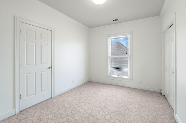 101 Christina Ct, Goodlettsville, TN 37072 - empty room with crown molding, baseboards, light carpet, and visible vents