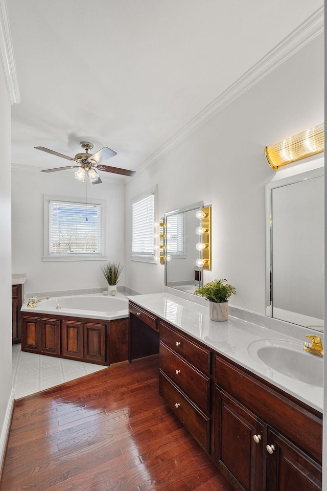 101 Christina Ct, Goodlettsville, TN 37072 - full bathroom with crown molding, a bath, wood finished floors, a sink, and double vanity