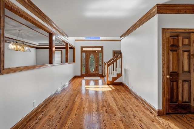 101 Christina Ct, Goodlettsville, TN 37072 - foyer entrance featuring stairway, visible vents, baseboards, and wood finished floors